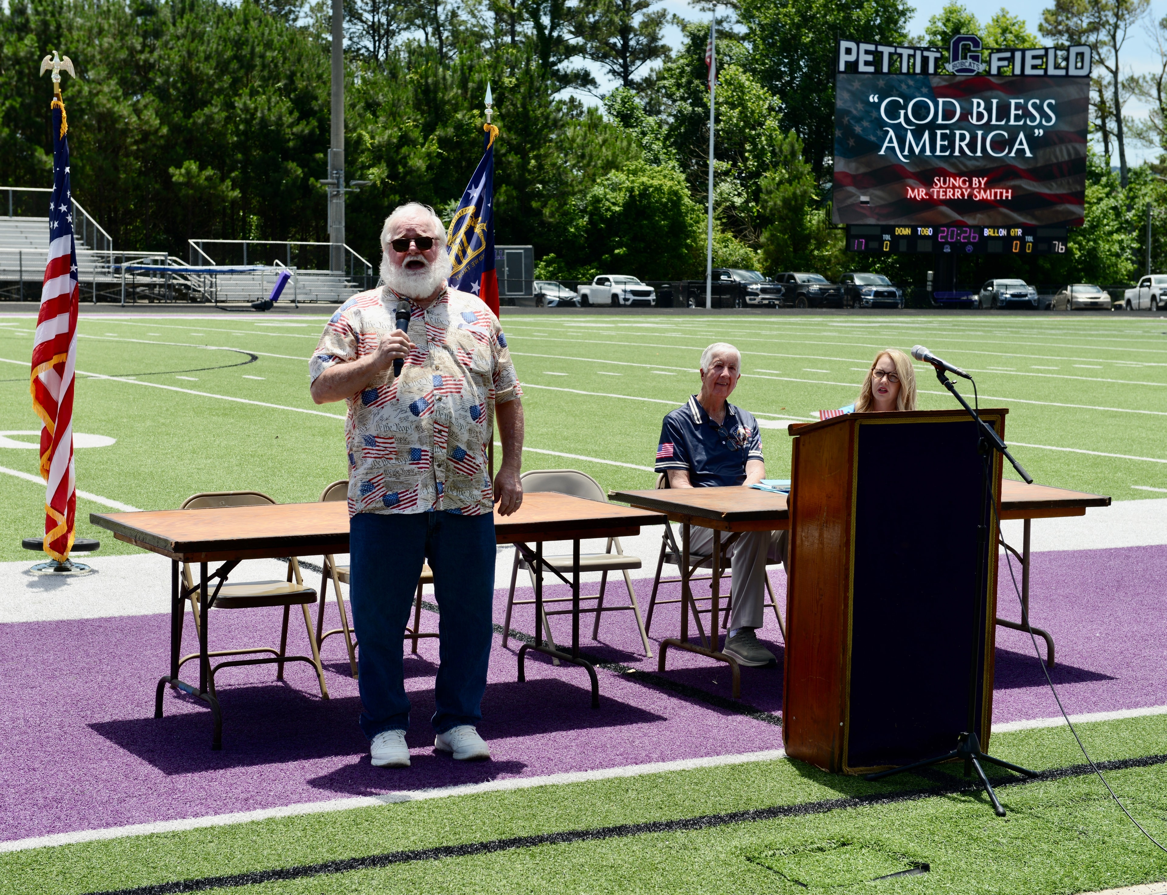 Terry Smith singing God Bless America at the Flag Day ceremony at Pettit Field