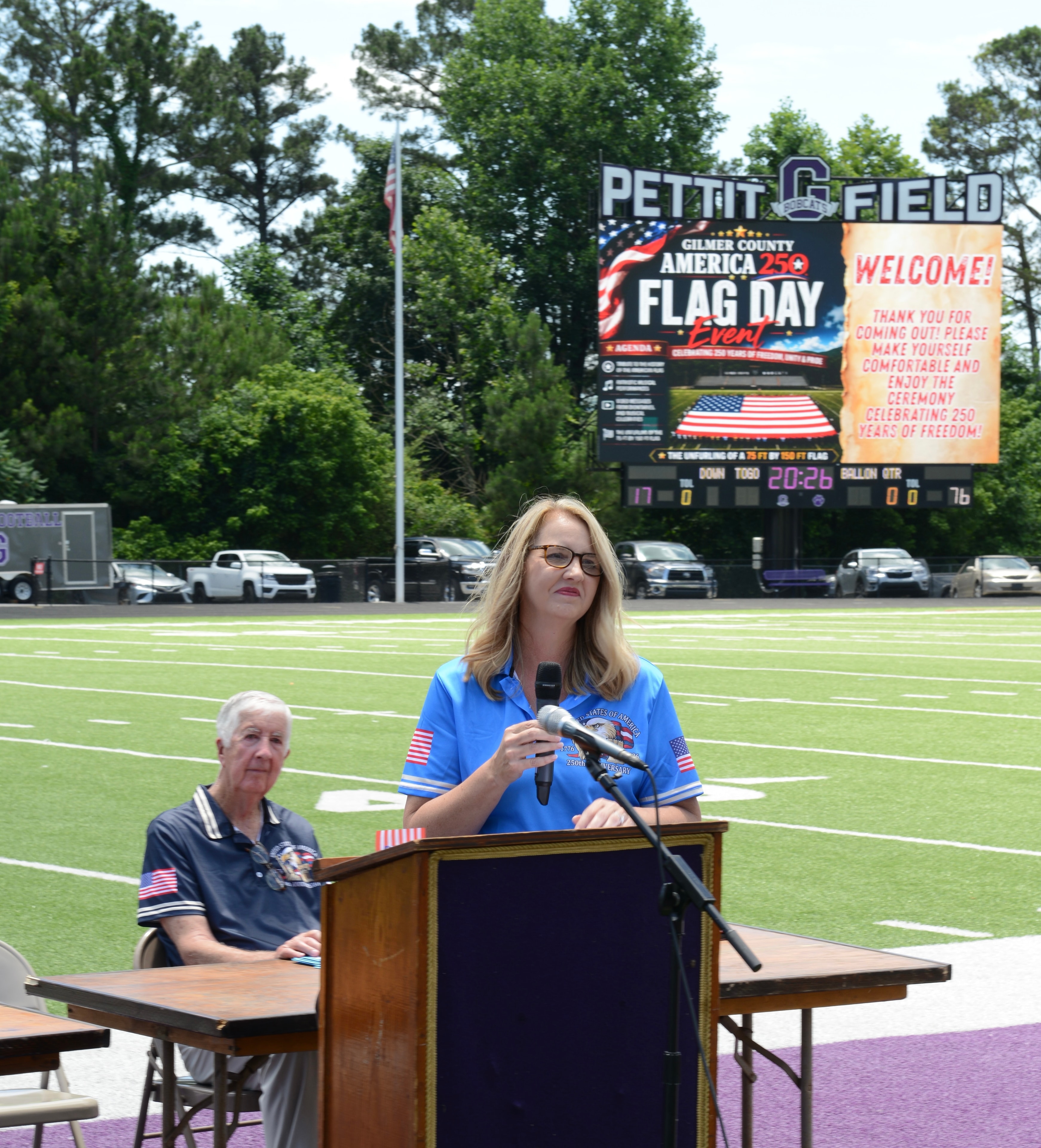 Presenter delivering the History of the Flag at the Flag Day ceremony at Pettit Field