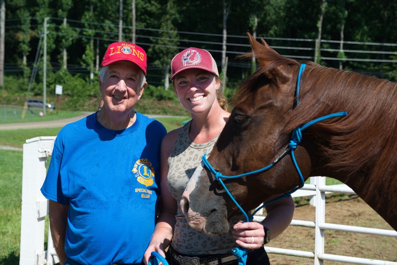 Lions Club member with horse at Special Friends