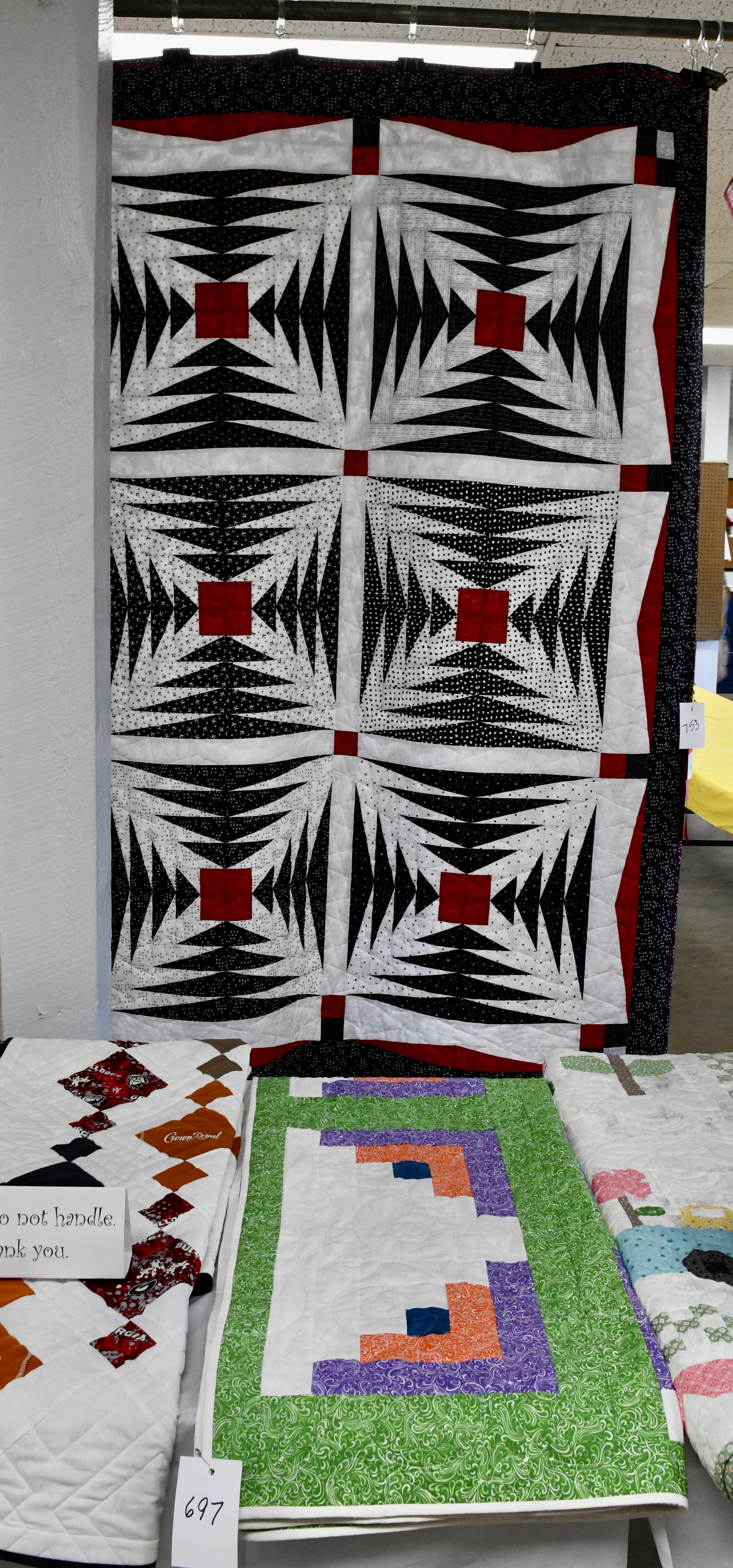 Geometric black white and red quilt displayed at the Gilmer County Fair