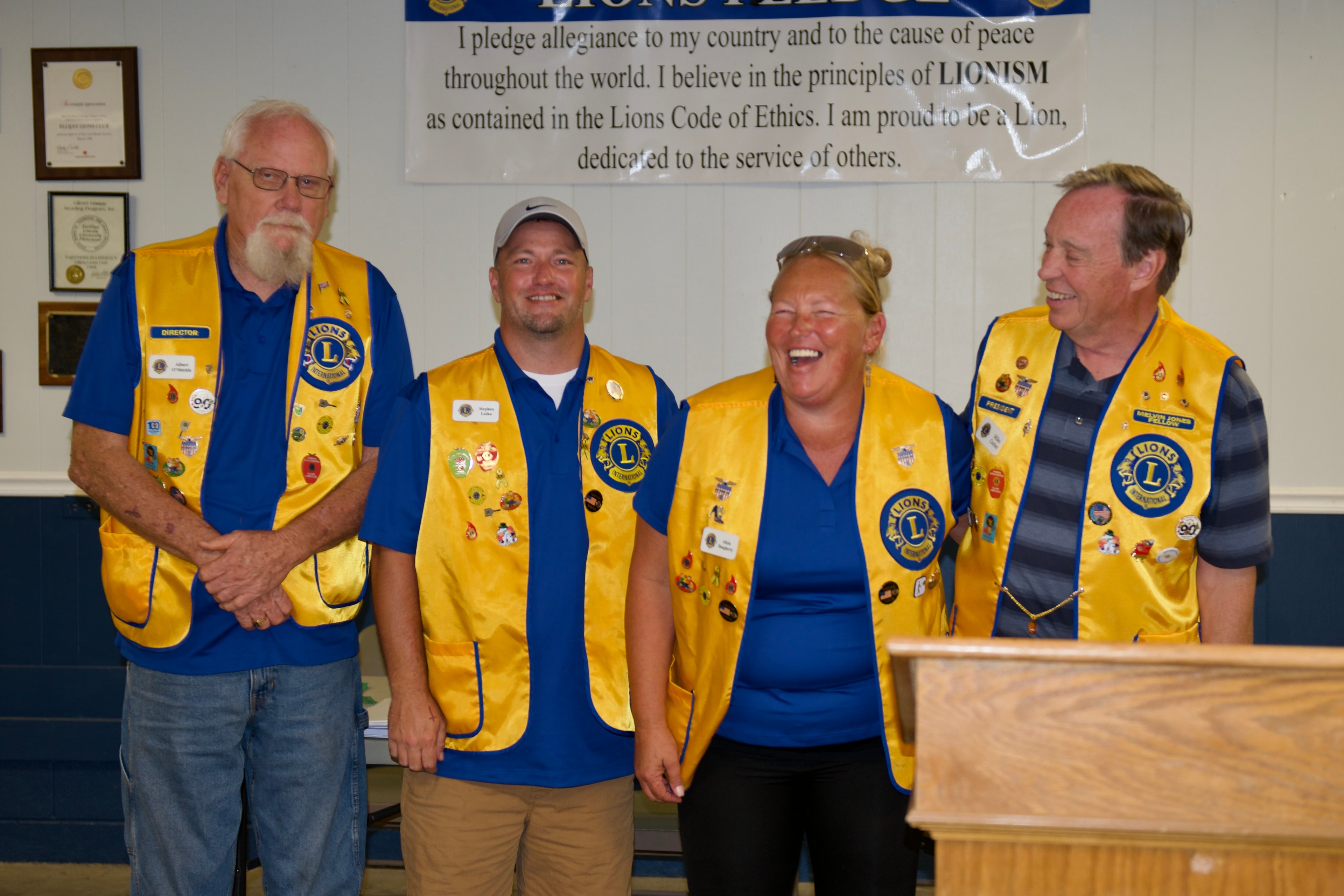 Lions Club members posing together at the awards ceremony